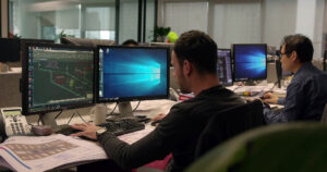 Shanghai-Office-Designer_on_Computer by M Moser Associates. 