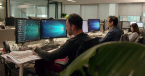 Shanghai-Office-Designer_on_Computer2 by M Moser Associates. 