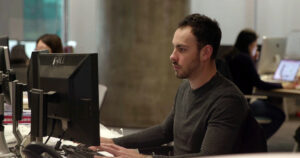 Shanghai-Office-Designer_on_Computer3 by M Moser Associates. 